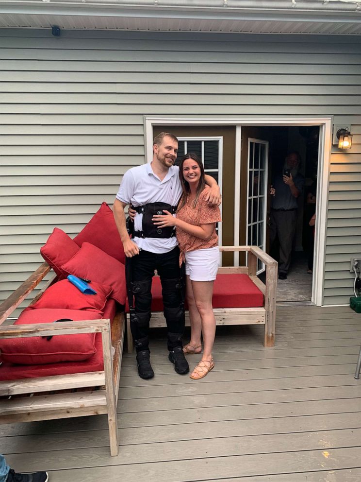 PHOTO: Josh Smith, who was paralyzed in an accident, used an exoskeleton suit to get down on one knee to propose to his girlfriend, Grace Thompson.