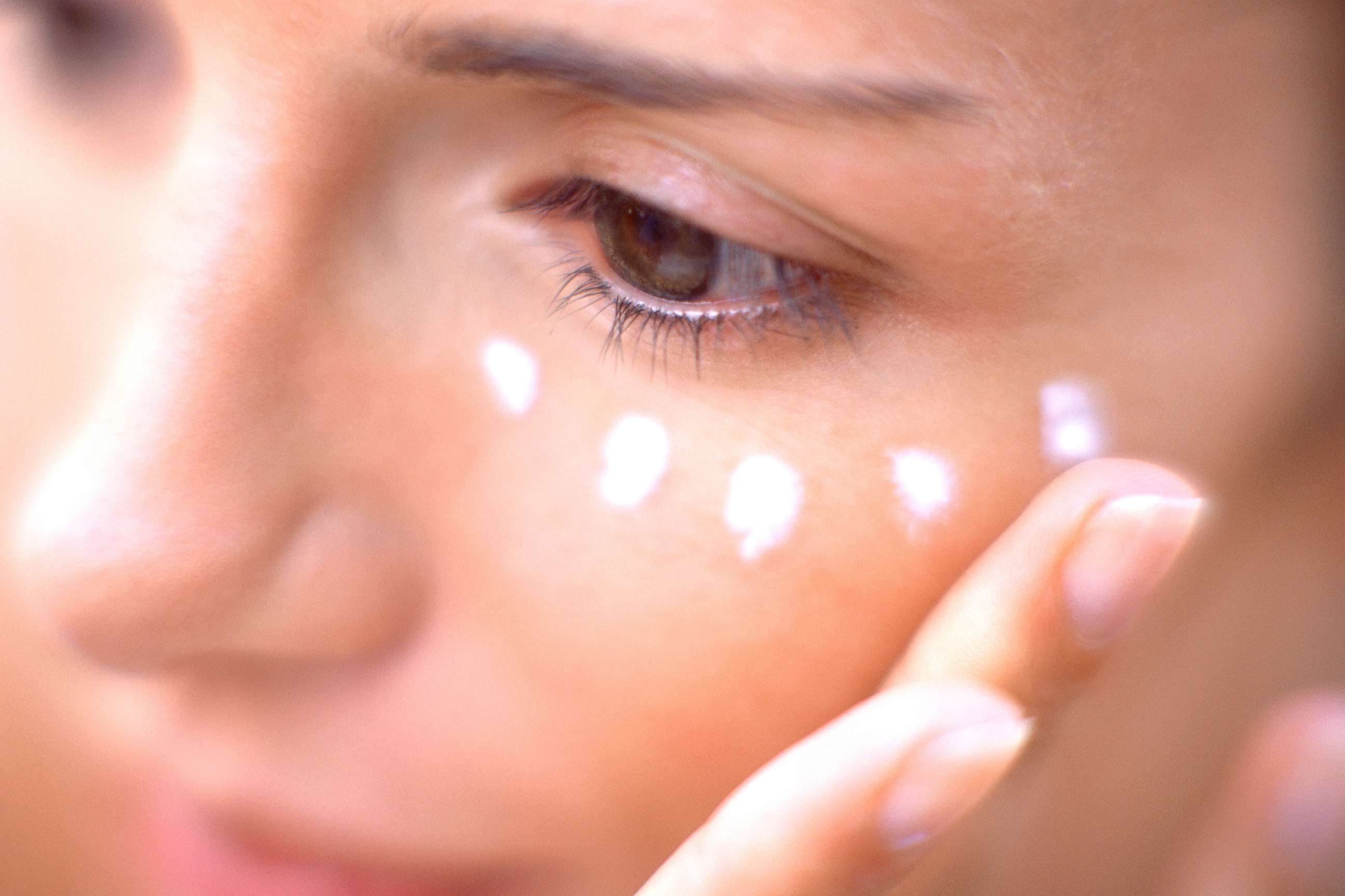 PHOTO: A woman puts on eye cream in an undated stock photo.