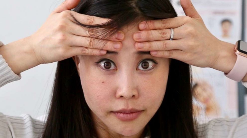 PHOTO: Koko Hayashi, founder of Face Yoga with Koko, teaches facial exercises.