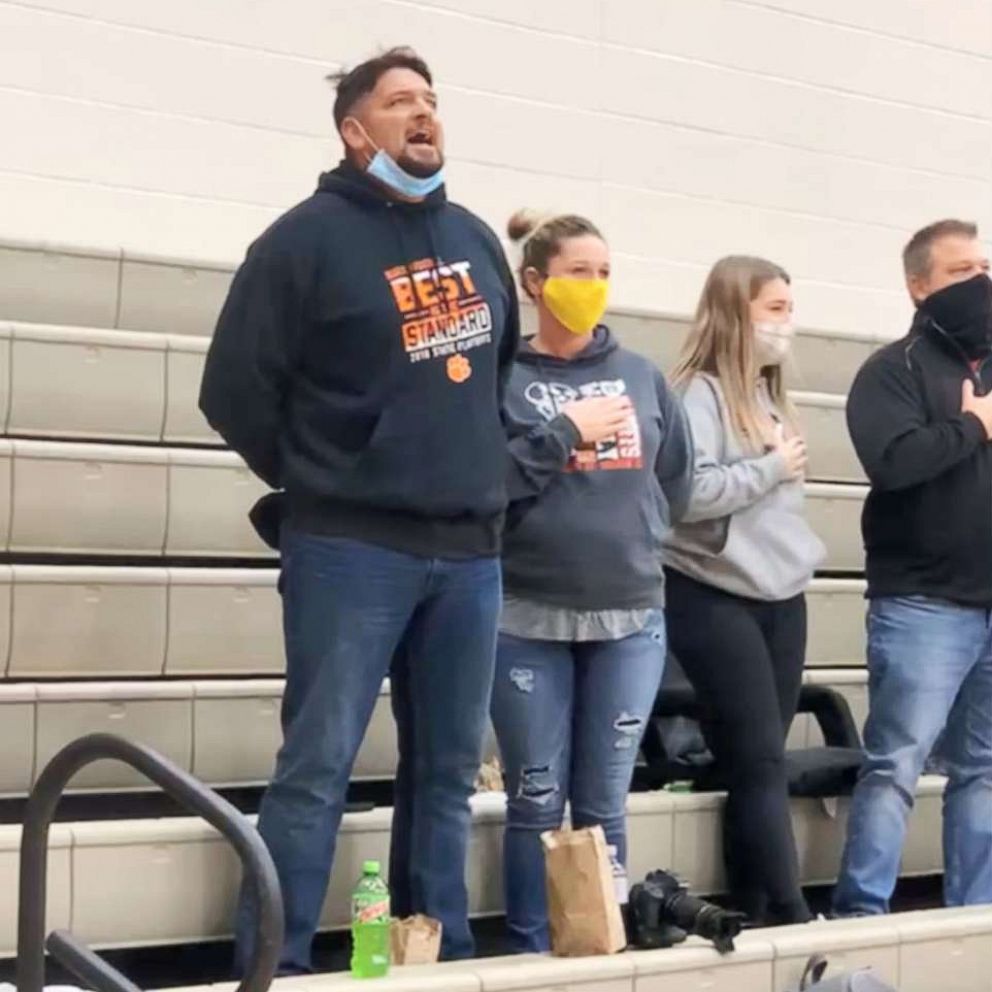 VIDEO: This Dad belting the national anthem has us in tears