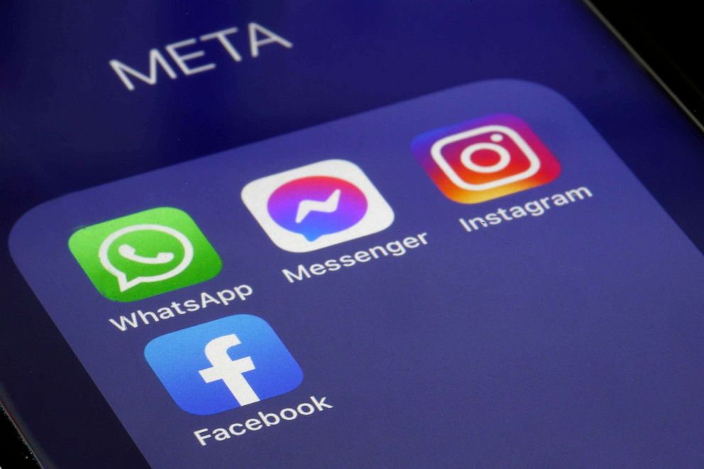 PHOTO: FILE - In this photo illustration, The logos of applications, WhatsApp, Messenger, Instagram and facebook belonging to the company Meta are displayed on the screen of an iPhone, Feb. 03, 2022 in Paris, France.