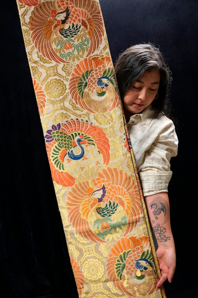 PHOTO: Caitlin Oiye Coon’s grandmother’s wedding obi is an ornate sash featuring gold embroidery with depictions of cranes and Mandarin ducks.