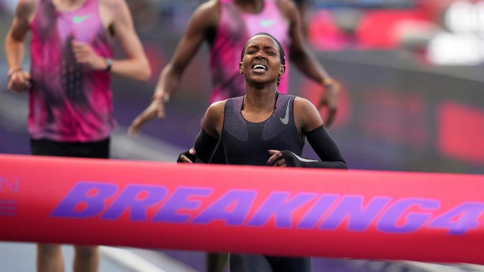 PHOTO: Faith Kipyegon, from Kenya, approaches the finish line in her attempt to become the first woman to run a mile in under four minutes, at Stade Charlety in Paris, June 26, 2025. 