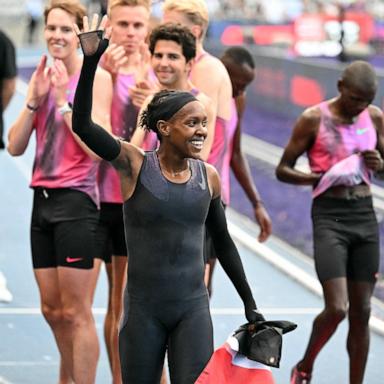 PHOTO: Kenya's Faith Kipyegon reacts at the end of her race after taking part in the "Breaking4" event, in an attempt to become the first woman to run a mile in under four minutes, at Stade Charlety, on June 26, 2025, in Paris. 