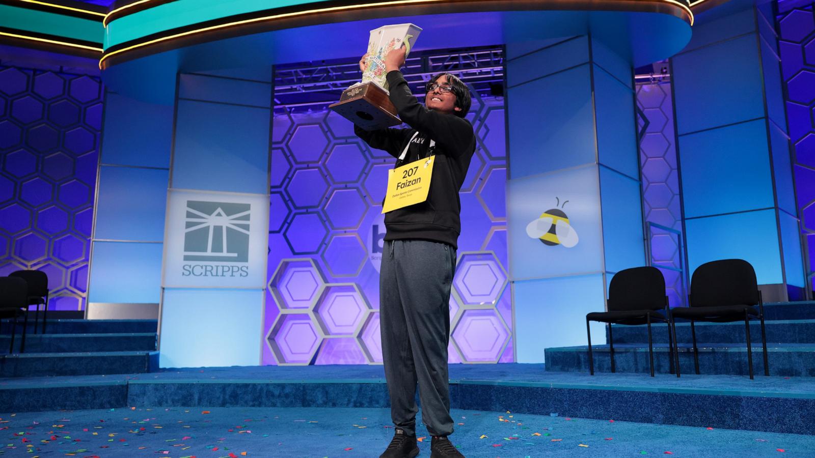 PHOTO: Faizan Zaki, 13, of Dallas, Texas holds the Scripps Cup after winning in the 21st round of the 2025 Scripps National Spelling Bee at the Gaylord National Resort and Convention Center on May 29, 2025 in National Harbor, Maryland.