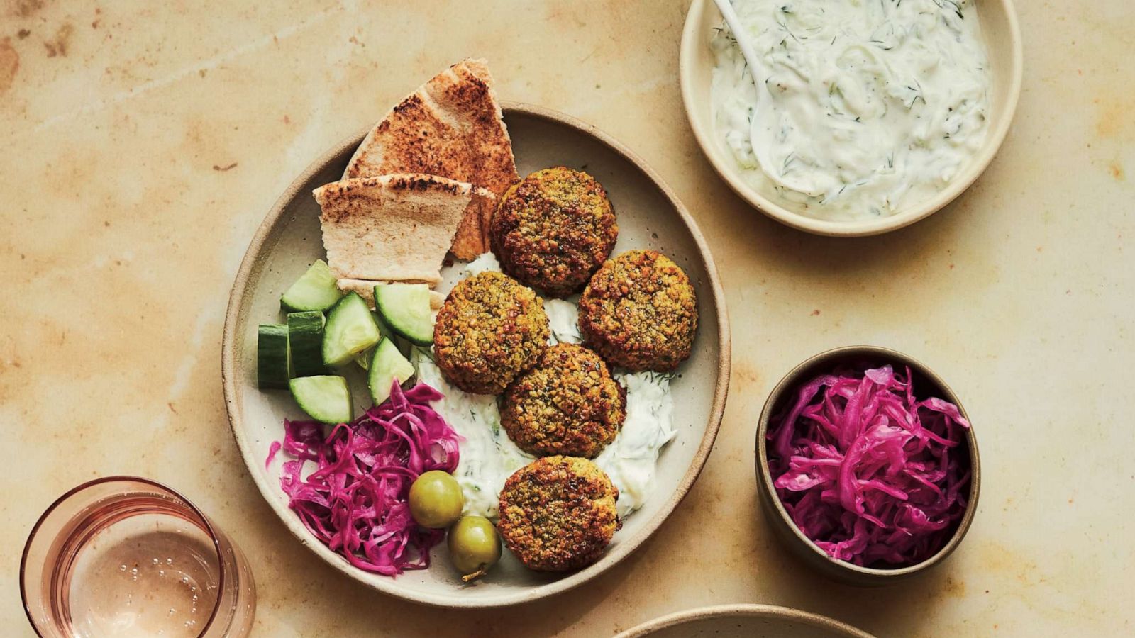 PHOTO: Homemade falafel bowls with pickled red onion and tzatziki.