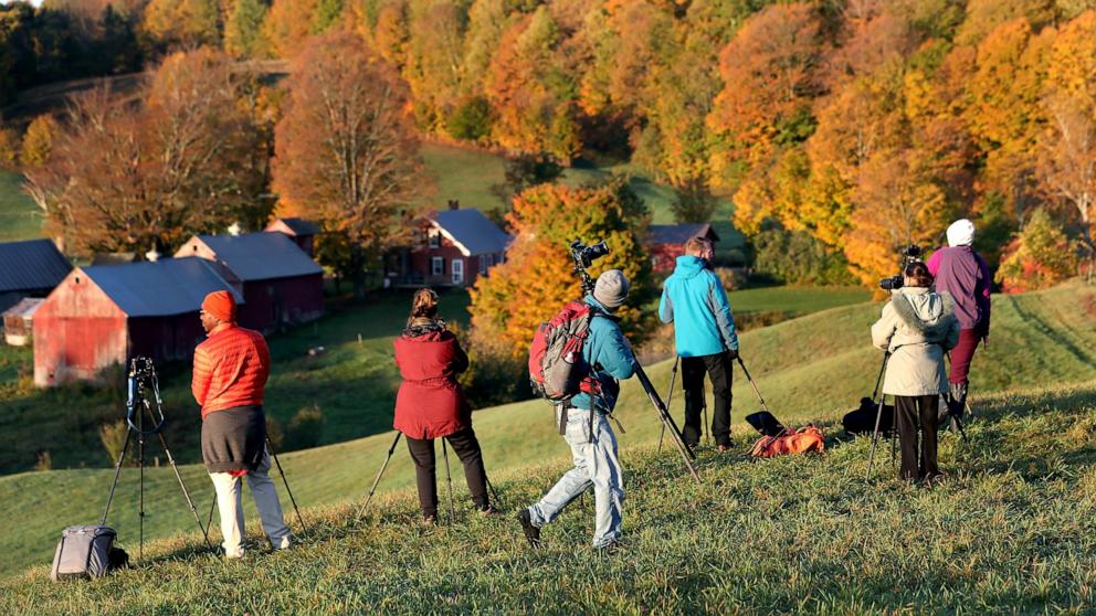 PHOTO: Photographers set up on a hill at Jenne Farm in Reading, VT on Oct. 12, 2017. 