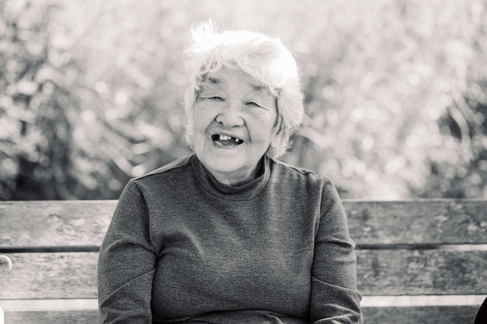 PHOTO: On March 25, Keiko Neutz of Louisville, Kentucky was hospitalized with COVID-19. The 87-year-old was under isolation, so Lacy Taylor, one of her 28 grandchildren, arranged it so Keiko would be surrounded by loved ones.