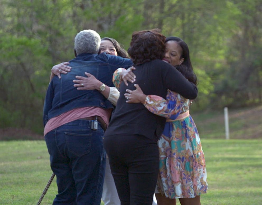 PHOTO: Kelley Dixon Tealer, Alva Marie Jenkins Linda Epps Parker, and Valerie Gray Holmes reunite for the first time after discovering their ancestral connection to Hawkins Wilson.