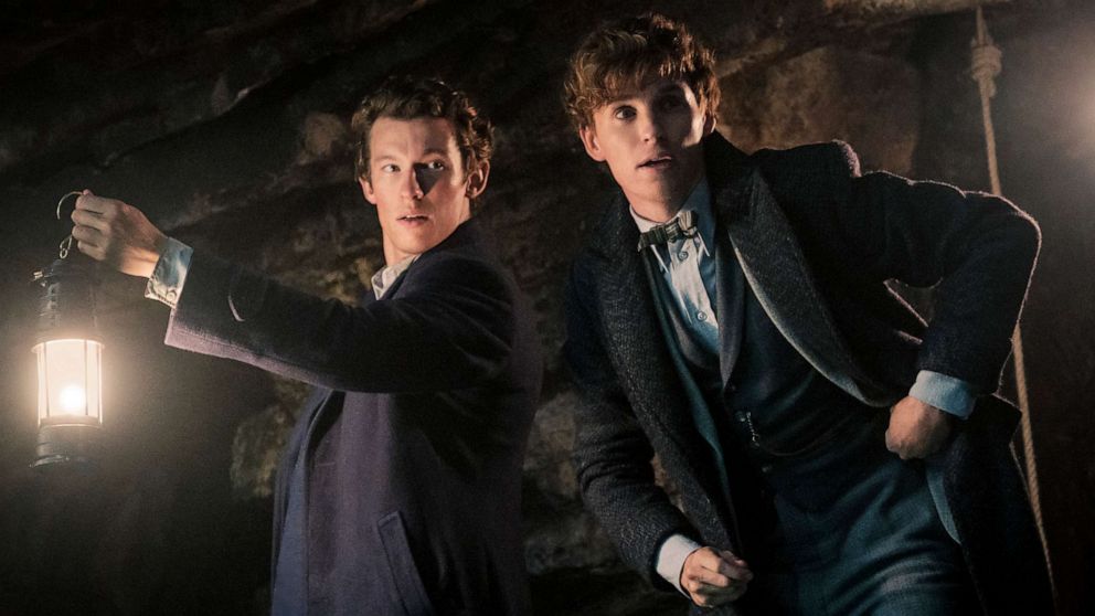 Callum Turner and Eddie Redmayne appear in a scene from "Fantastic Beasts: The Secrets of Dumbledore."