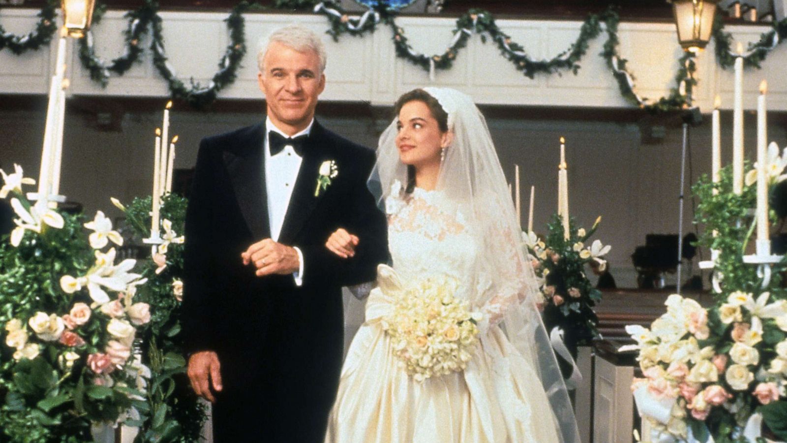 PHOTO: Steve Martin walking down the aisle with Kimberly Williams-Paisley in a scene from the film "Father Of The Bride," 1991.