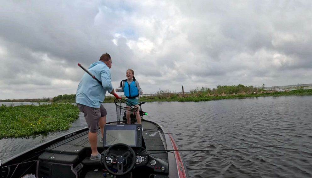 PHOTO: Matt Brewster’s 9-year-old daughter Ali burst into tears of joy after catching a nearly five-and-a-half-pound bass on their trip together.