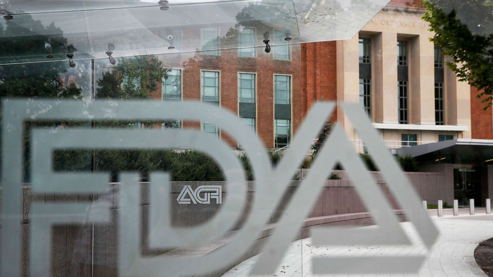 PHOTO: The U.S. Food and Drug Administration building behind is seen behind FDA logos at a bus stop on the agency's campus in Silver Spring, Md., Aug. 2, 2018.