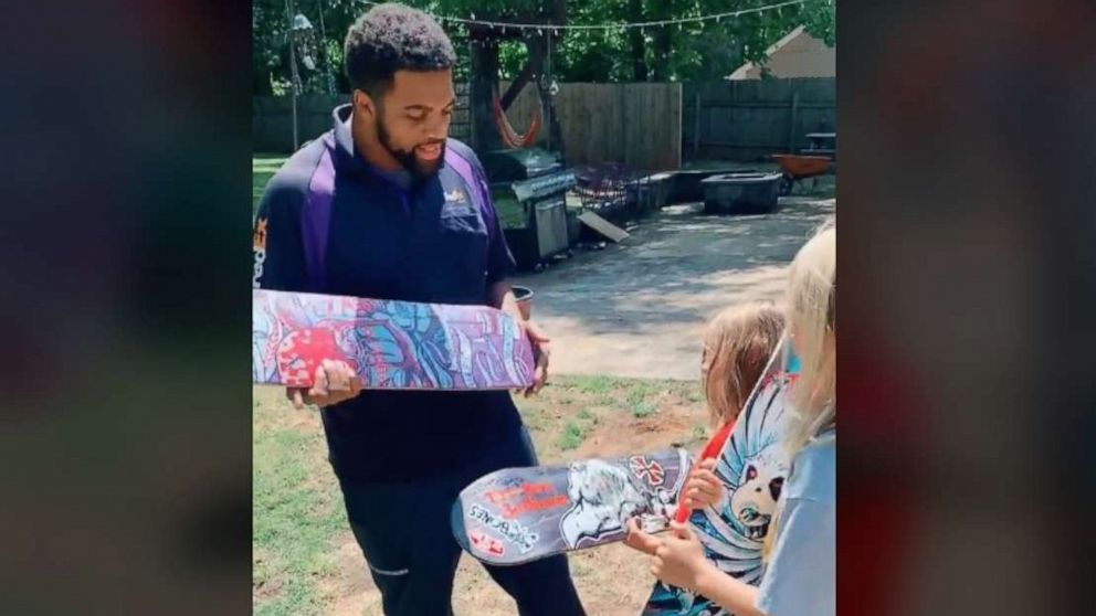 PHOTO: Mikail Farrar, a FedEx driver in Suwanee, Georgia, helped neighborhood boys Cooper, 6 and his brother, Tucker, 9, exchange skateboards with Tony Hawk after his TikTok video went viral.