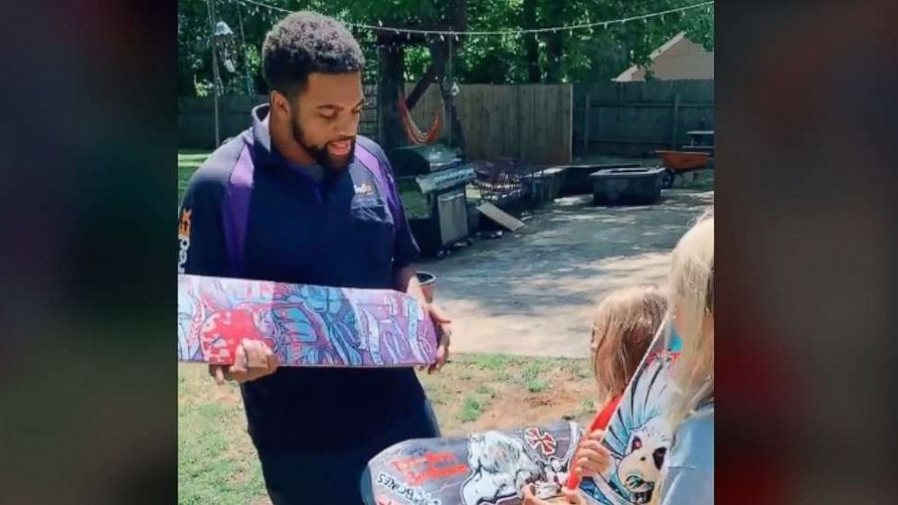 PHOTO: Mikail Farrar, a FedEx driver in Suwanee, Georgia, helped neighborhood boys Cooper, 6 and his brother, Tucker, 9, exchange skateboards with Tony Hawk after his TikTok video went viral.