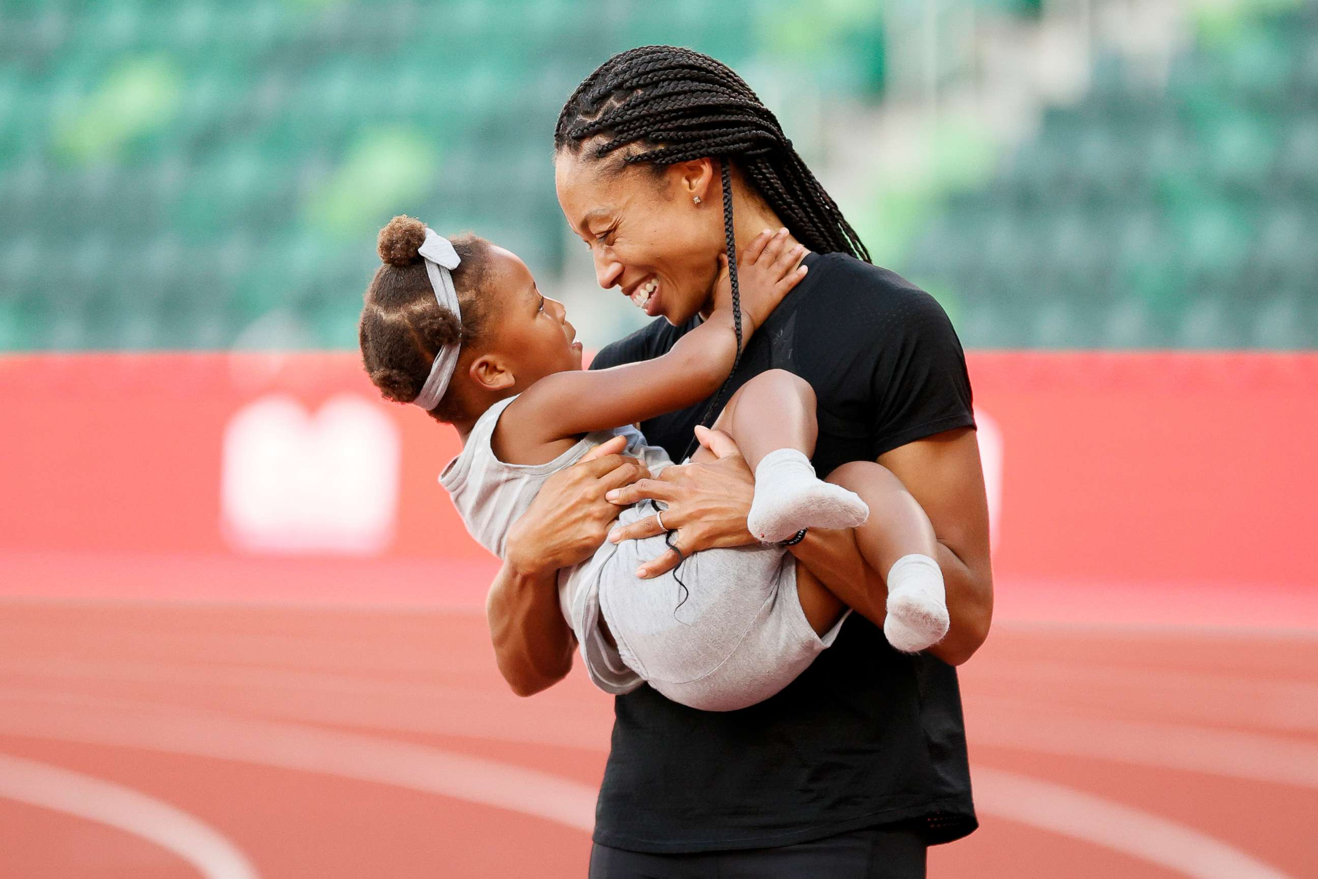 PHOTO: Allyson Felix celebrates with her daughter Camryn after day nine of the 2020 U.S. Olympic Track & Field Team Trials at Hayward Field on June 26, 2021, in Eugene, Oregon.