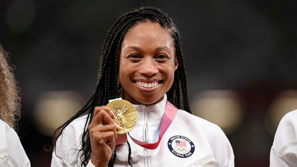 PHOTO: Gold medal winner Allyson Felix of Team United States stands on the podium during the medal ceremony for the Women's 4 x 400m Relay on day fifteen of the Tokyo 2020 Olympic Games at Olympic Stadium on Aug. 07, 2021, in Tokyo, Japan.