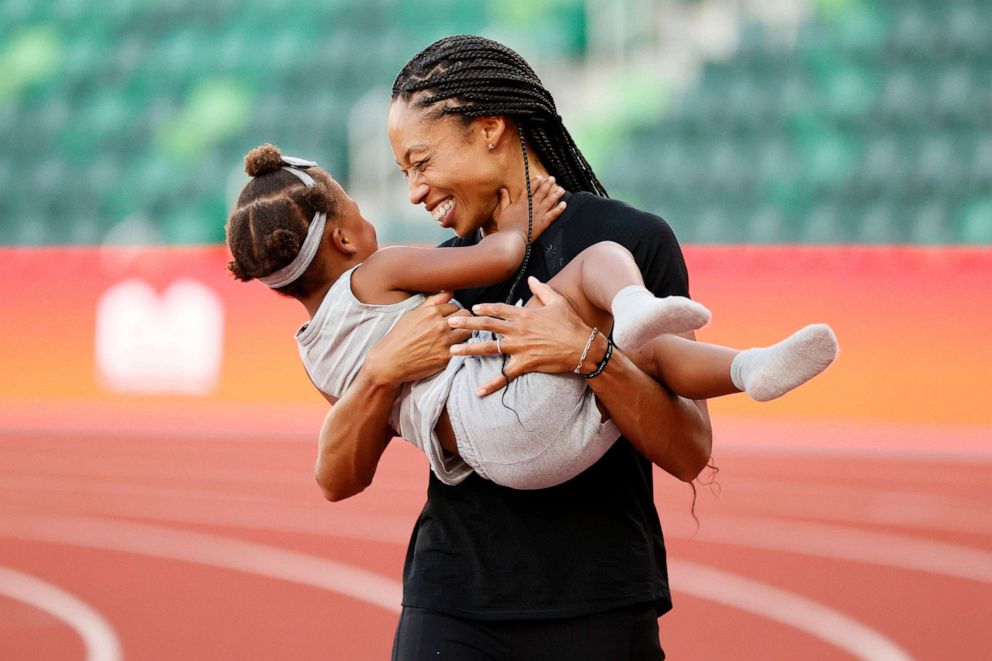 PHOTO: Allyson Felix celebrates with her daughter Camryn at the 2020 U.S. Olympic Track & Field Team Trials at Hayward Field on June 26, 2021 in Eugene, Oregon.