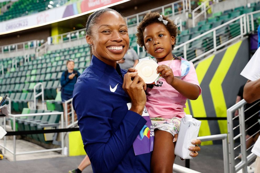 PHOTO: Bronze medalist Allyson Felix of Team United States with her daughter Camryn after winning bronze in the 4x400m Mixed Relay Final on day one of the World Athletics Championships Oregon22 at Hayward Field, July 15, 2022, in Eugene, Ore.