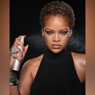 PHOTO: Rihanna shows off natural curls while unveiling Fenty Beauty Makeup-Extending Setting Spray.