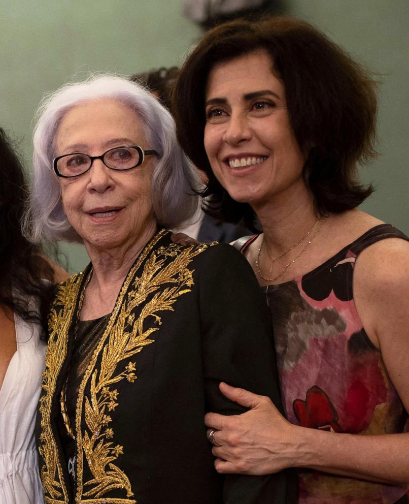 PHOTO: Fernanda Montenegro, left, and her daughter Fernanda Torres, pose for a photo after Brazilian songwriter and former Culture Minister Gilberto Gil's swearing-in ceremony as a new "immortal," April 8, 2022, in Rio de Janeiro.