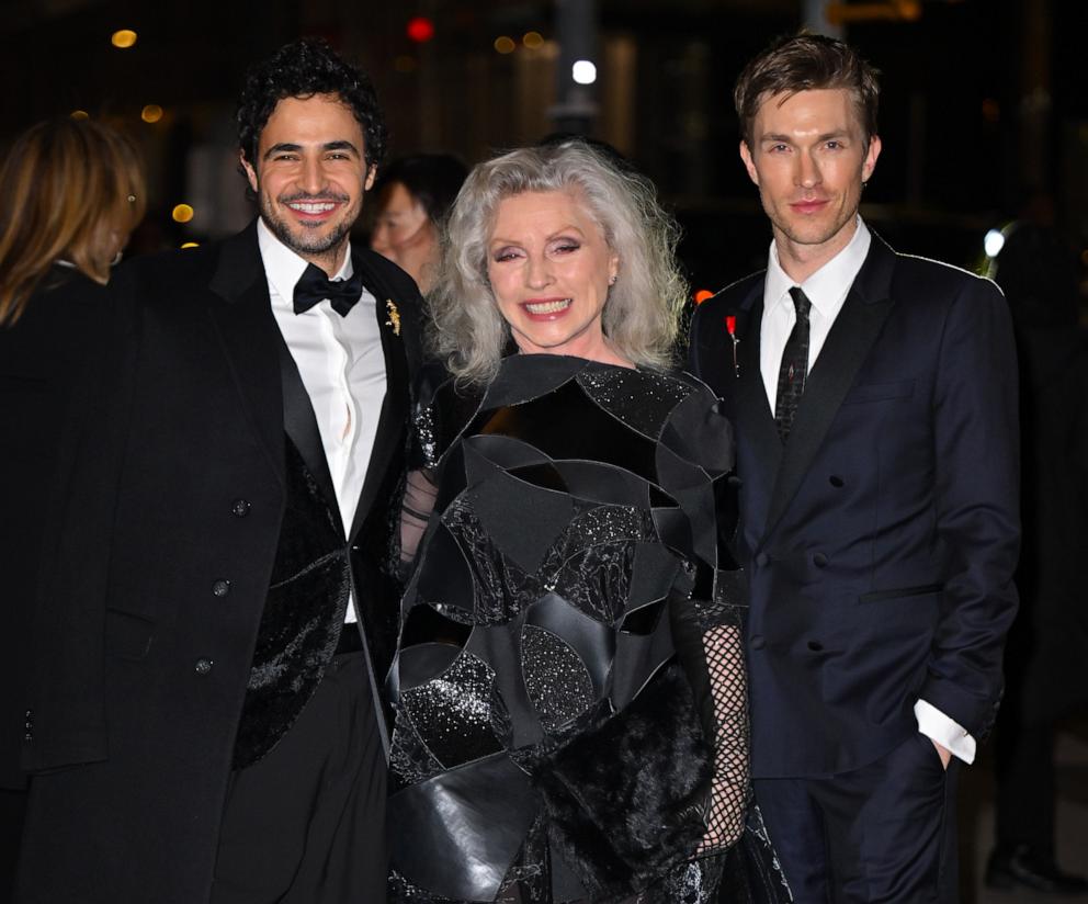 PHOTO: Zac Posen, left, Debbie Harry, center, and Harrison Ball arrive to FX's "Feud: Capote vs. The Swans" premiere at the Museum of Modern Art, Jan. 23, 2024, in New York.