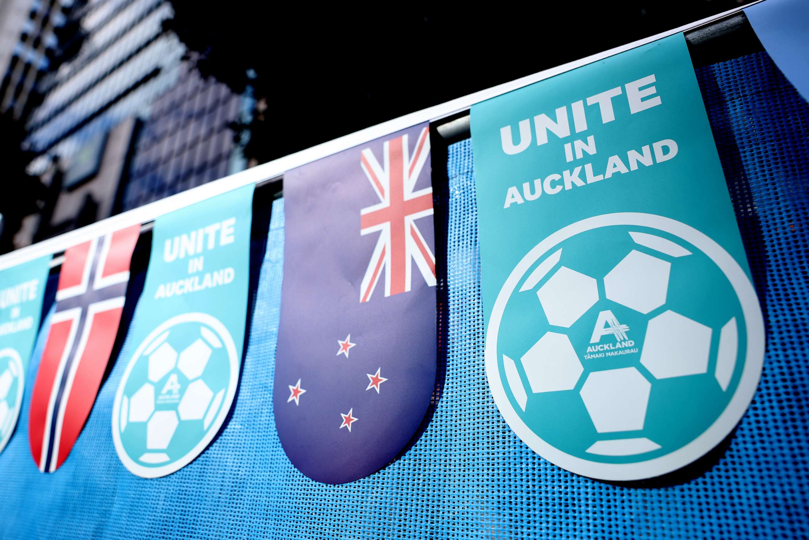 PHOTO: A sign reading "Unite in Auckland" is hung ahead of the FIFA World Cup Australia & New Zealand 2023 on July 16, 2023, in Auckland, New Zealand.