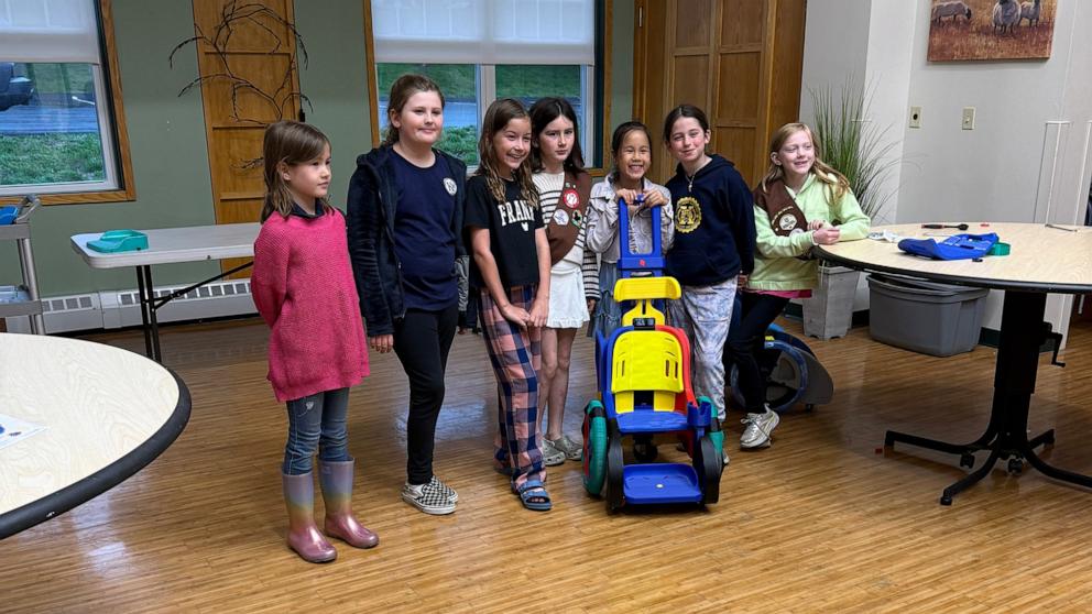 PHOTO: The members of Girl Scout Troop 77502 used cookie sale money to build a pediatric wheelchair from 3D-printed plastic parts.