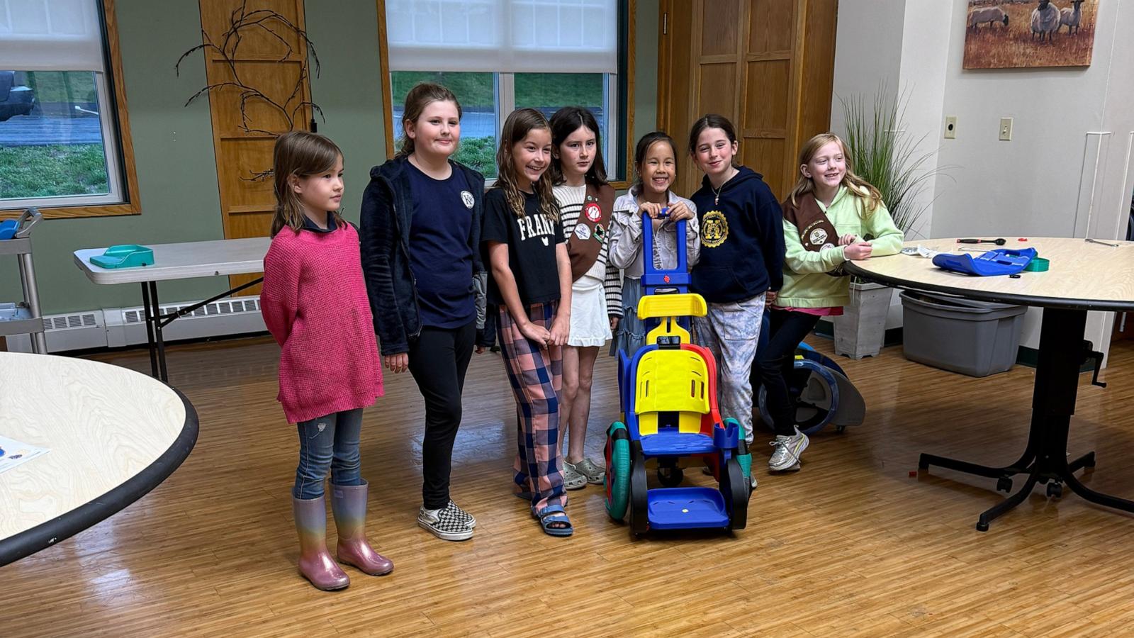 PHOTO: The members of Girl Scout Troop 77502 used cookie sale money to build a pediatric wheelchair from 3D-printed plastic parts.
