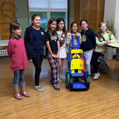 PHOTO: The members of Girl Scout Troop 77502 used cookie sale money to build a pediatric wheelchair from 3D-printed plastic parts.