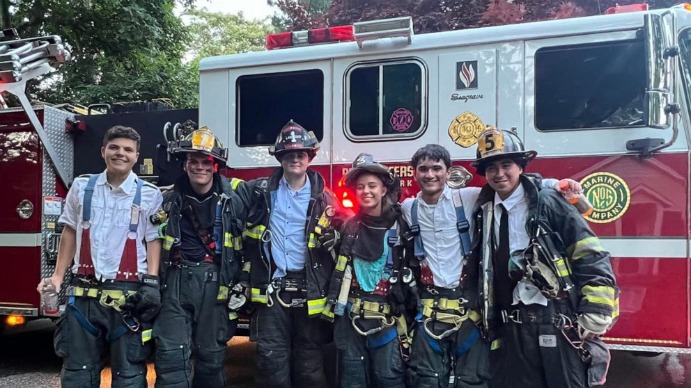 PHOTO: Six students from Port Jefferson High School on Long Island, who are fire department volunteers, raced to help put out a blaze just moments after collecting their diplomas.