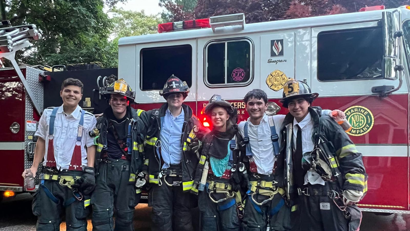 PHOTO: Six students from Port Jefferson High School on Long Island, who are fire department volunteers, raced to help put out a blaze just moments after collecting their diplomas.