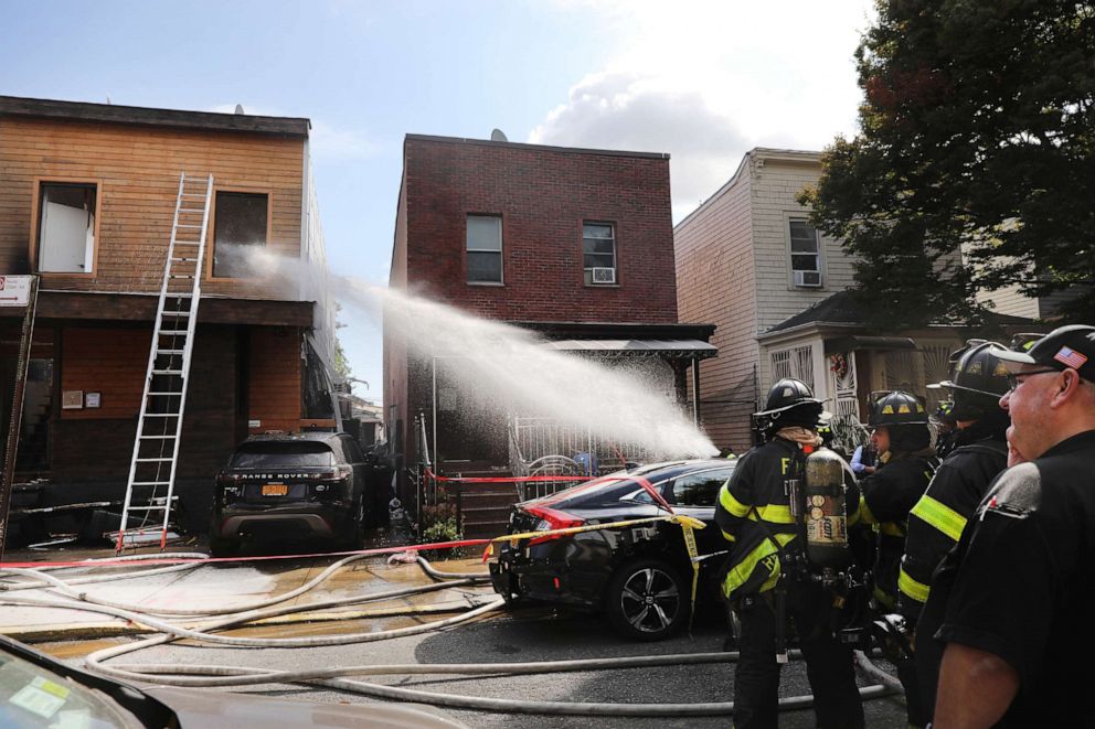 PHOTO: Firefighters spray water on a house fire with reports of an explosion on Sept. 30, 2019 in Brooklyn, N.Y.