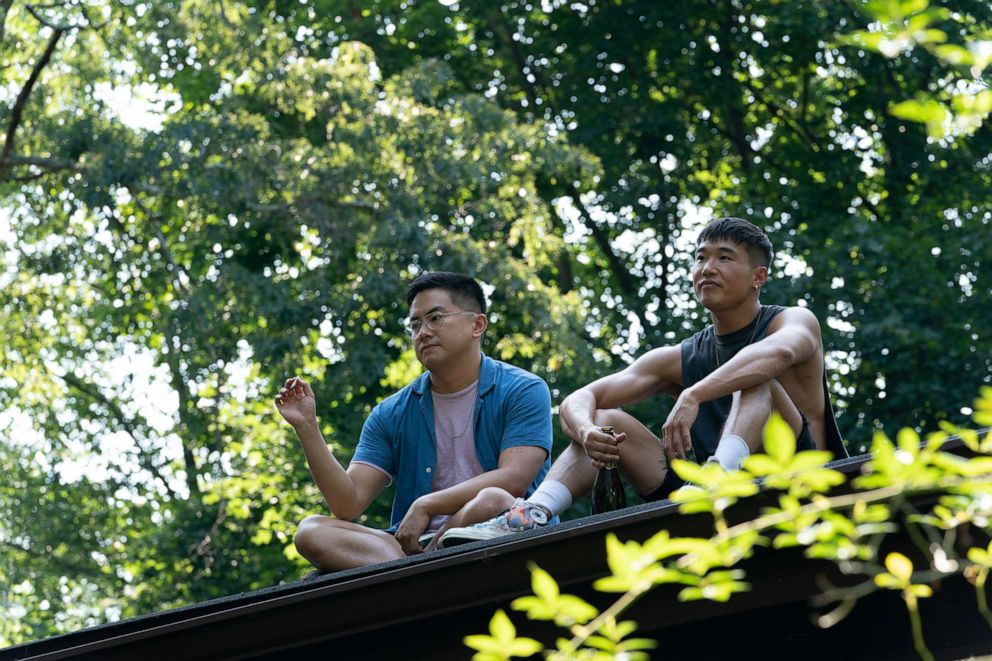 PHOTO: Bowen Yang and Joel Kim Booster are pictured in a scene from the film "Fire Island."