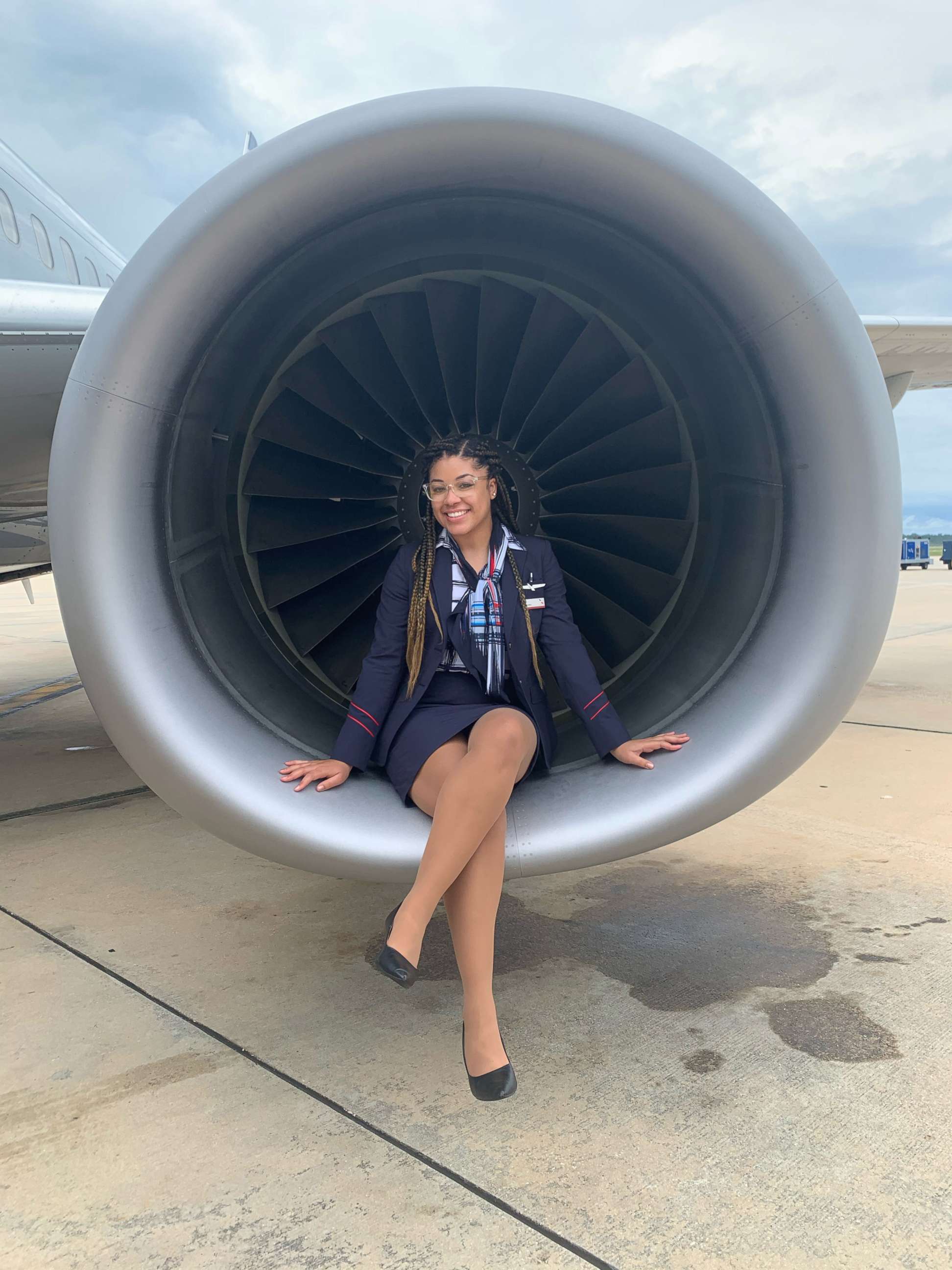 PHOTO: American Airlines flight attendant, Breaunna Ross, 29, poses on a plane's engine.