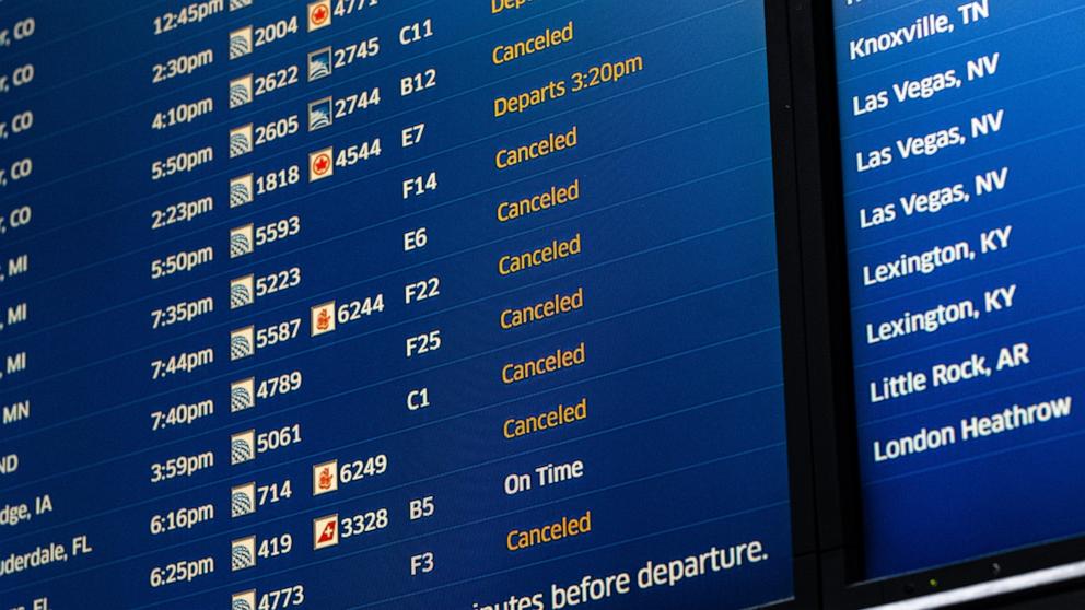 PHOTO: A United Airlines flight information board shows multiple canceled flights in Terminal 1 of O'Hare Airport, Jan. 12, 2024, in Chicago.