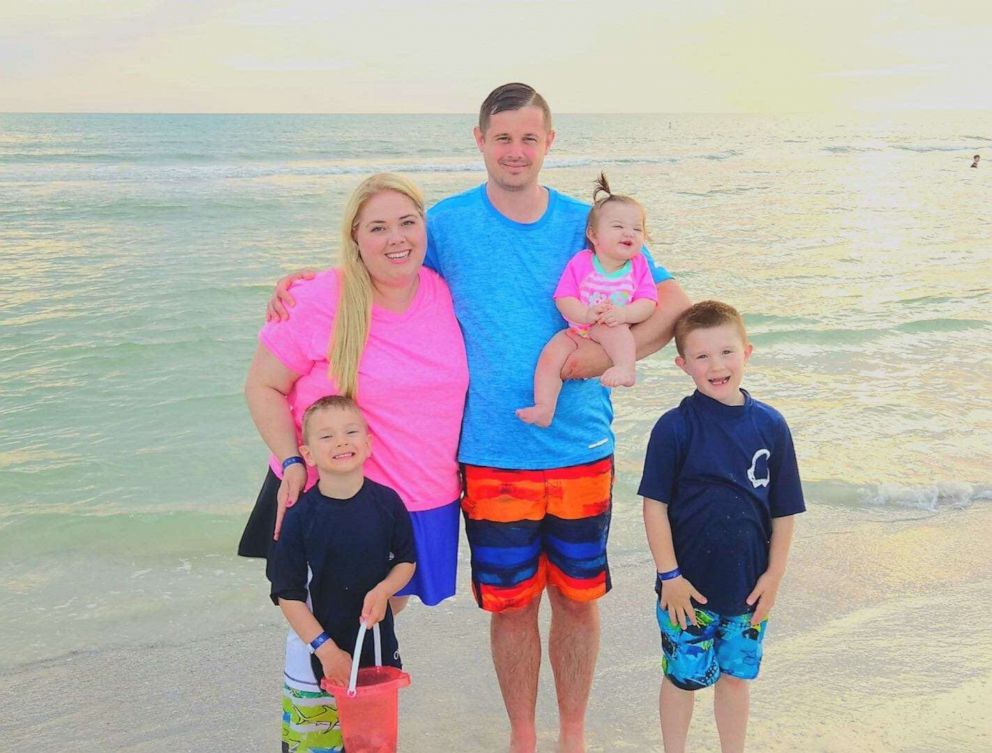 PHOTO: Ashley Dowell is pictured here with her husband, Will, and their children.