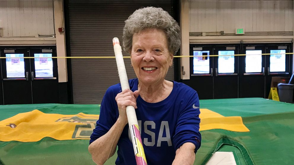 Florence "Flo" Filion Meiler, an 84-year-old record-setting pole vaulter, poses while training at the University of Vermont indoor track in Burlington, Vt., March 13, 2019.