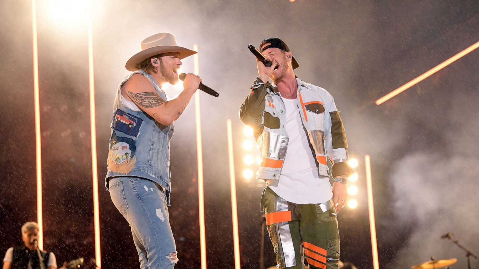 PHOTO:Brian Kelley and Tyler Hubbard of Florida Georgia Line perform on stage during day 1 of 2019 CMA Music Festival, June 6, 2019, in Nashville, Tenn.