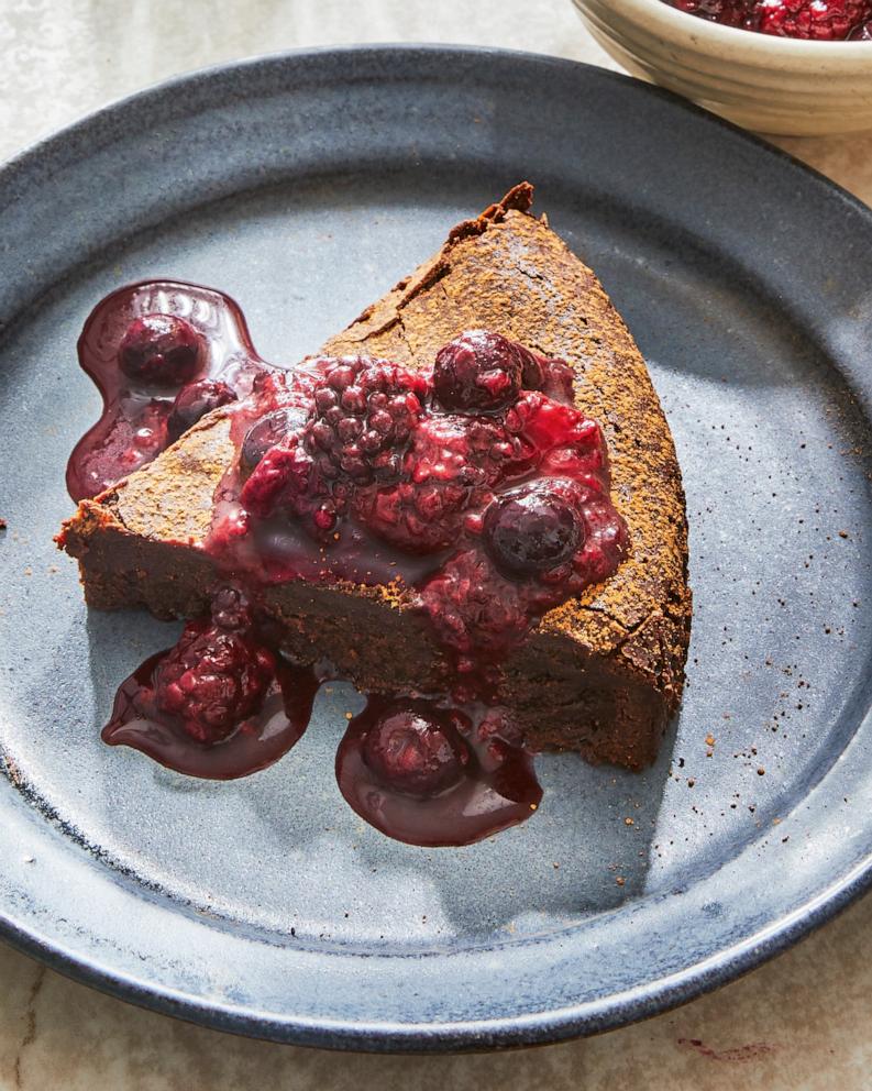 PHOTO: A flourless chocolate cake with compote from Suzy Karadsheh's new cookbook, "The Mediterranean Dish: Simply Dinner."