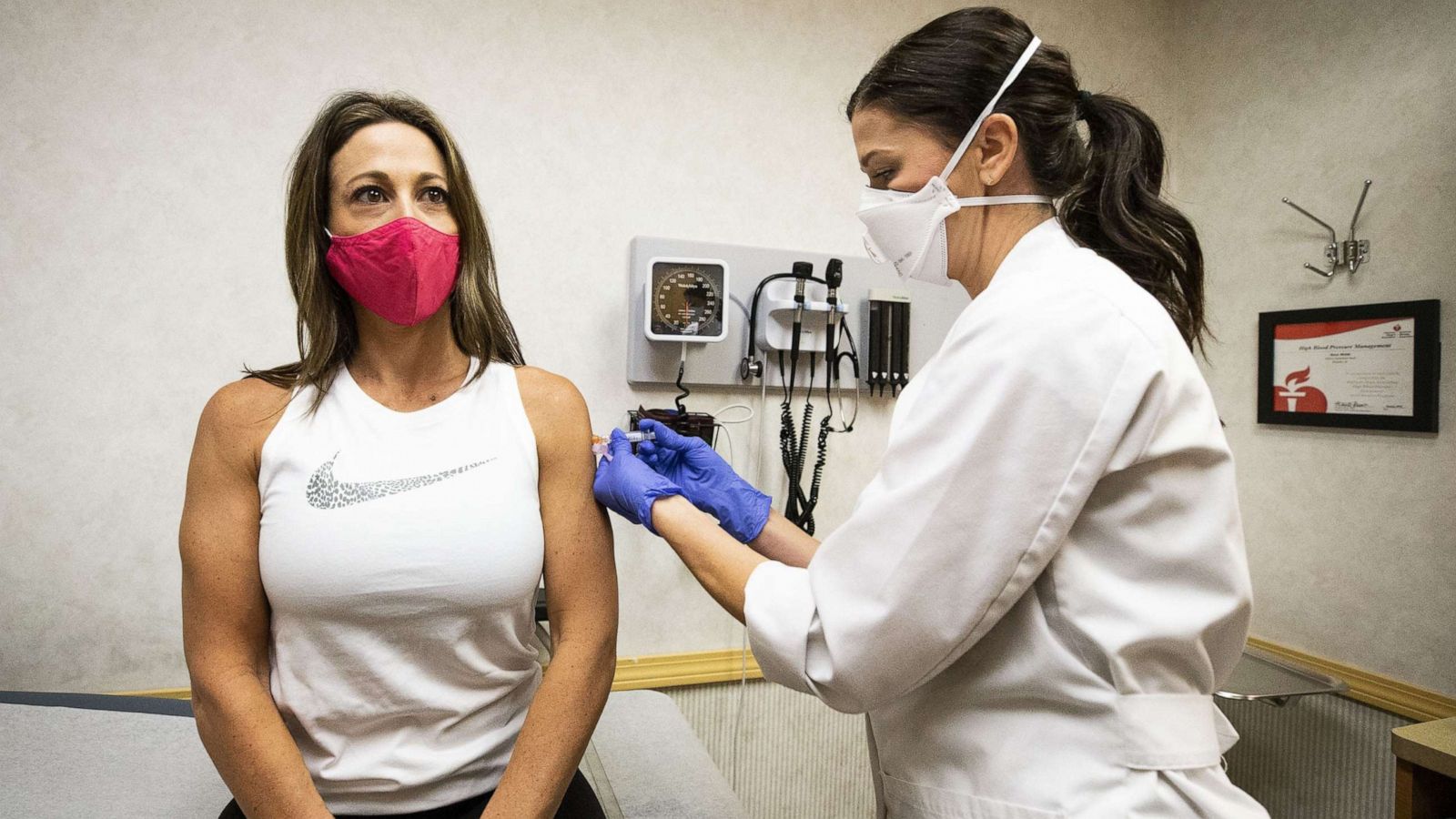 PHOTO: Melina Macchiavelli receives a flu shot from Elizabeth Lillenurms, a Nurse Practitioner (right) at the CVS MinuteClinic near 16th Street and Camelback Road.Flu Shot