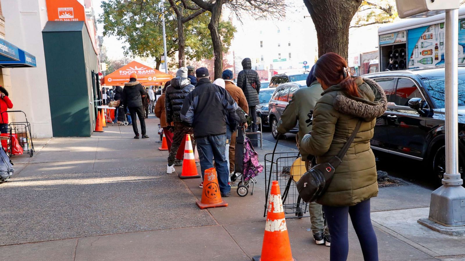 PHOTO: In this Nov. 24, 2021, file photo, people wait in line at the Food Bank for New York City's Community Kitchen in New York.