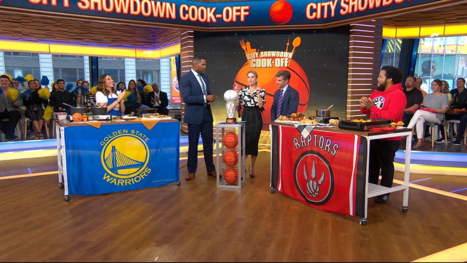 PHOTO: Toronto Raptors fan Roger Mooking, right, and Golden State Warriors fan Leah Cohen share recipes for the NBA Finals.