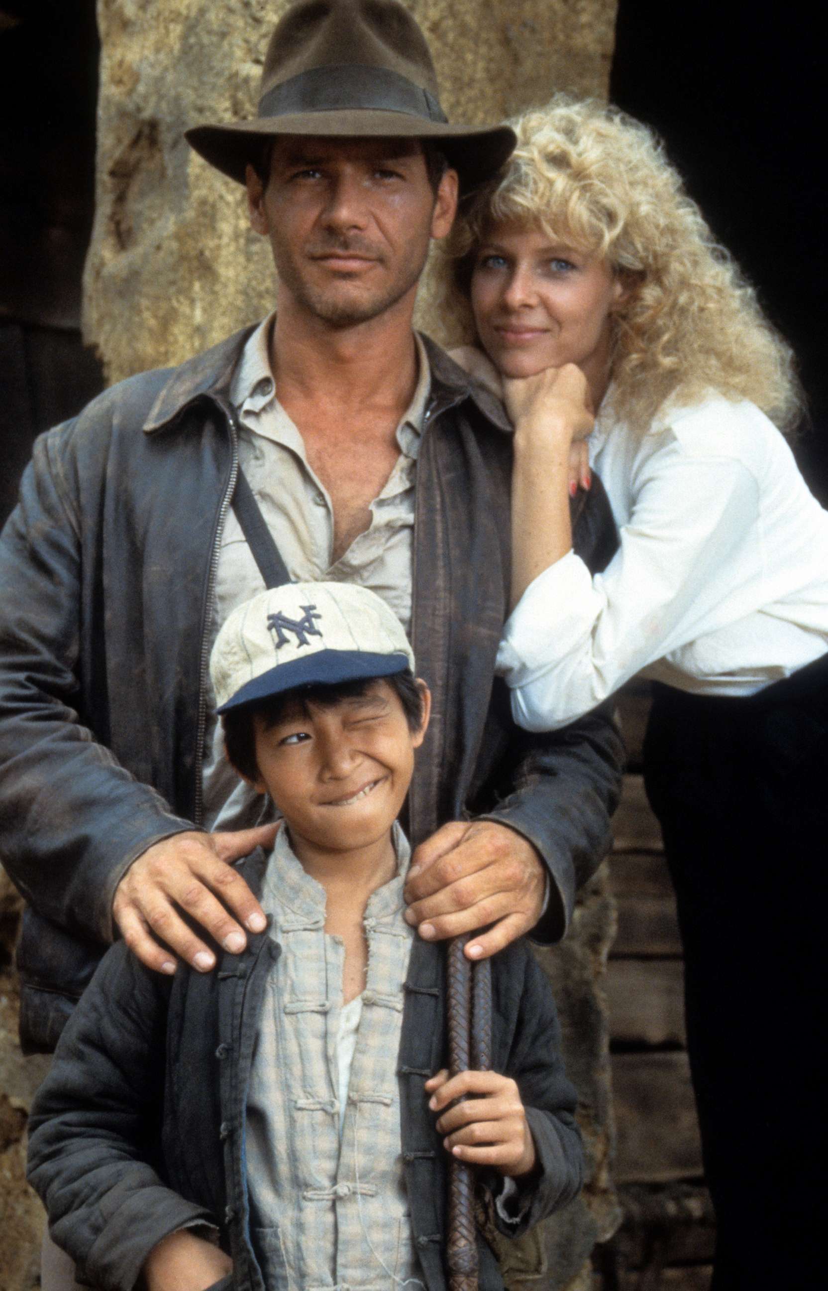 PHOTO: Harrison Ford, Jonathan Ke Quan and Kate Capshaw on set of the film "Indiana Jones And The Temple Of Doom" in 1984.