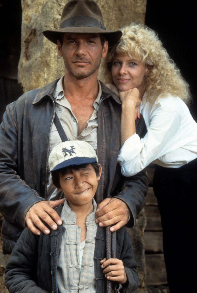 PHOTO: Harrison Ford, Jonathan Ke Quan and Kate Capshaw on set of the film "Indiana Jones And The Temple Of Doom" in 1984.