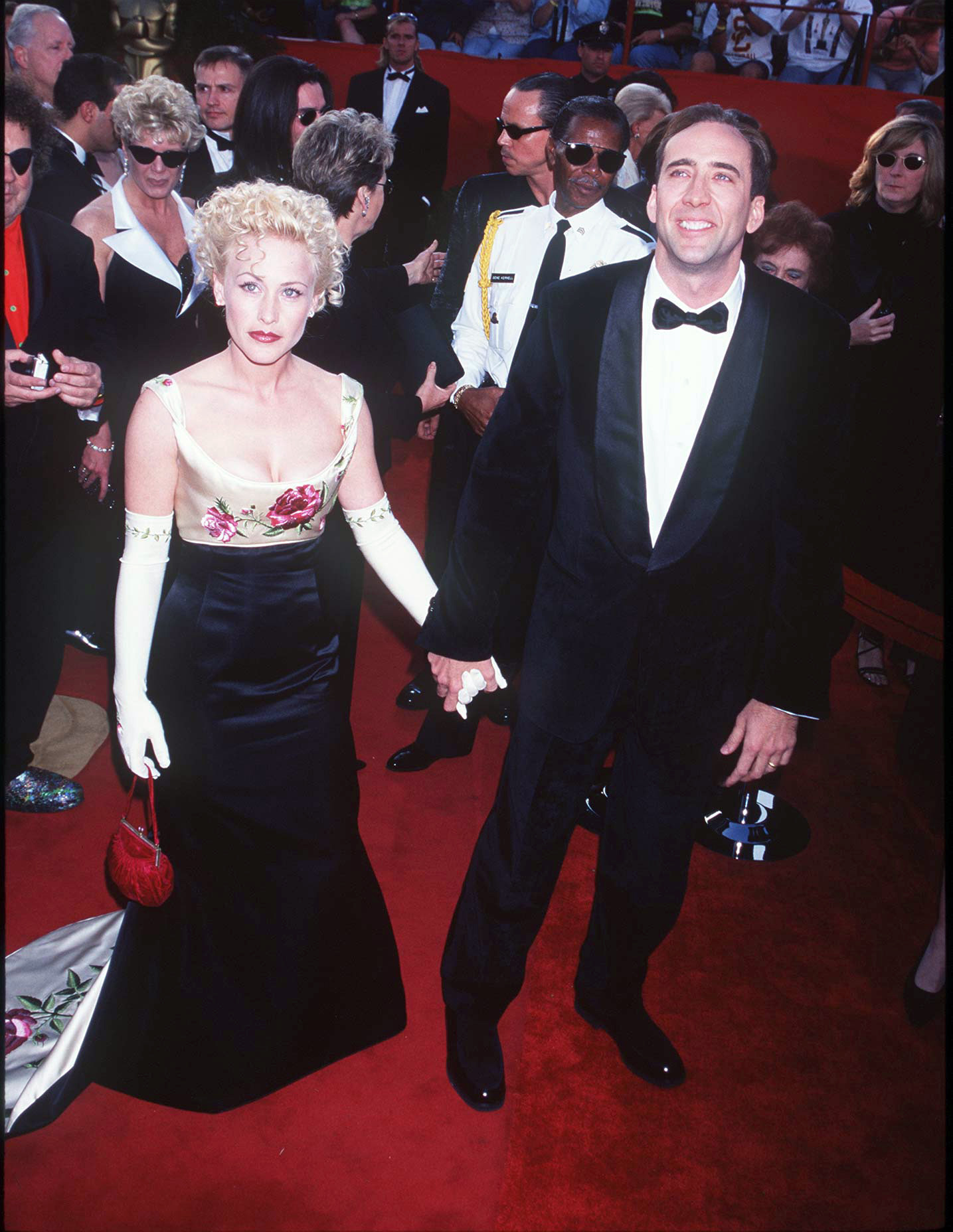 PHOTO: Patricia Arquette and Nicolas Cage arrive for the 69th Annual Academy Awards at Shrine Auditorium in Los Angeles, March 24, 1997.