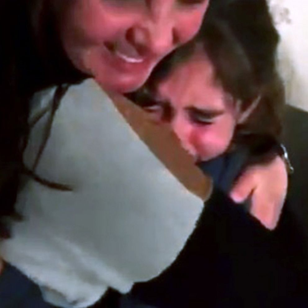 VIDEO: Mom and daughter jump up and down with joy as in person school resumes