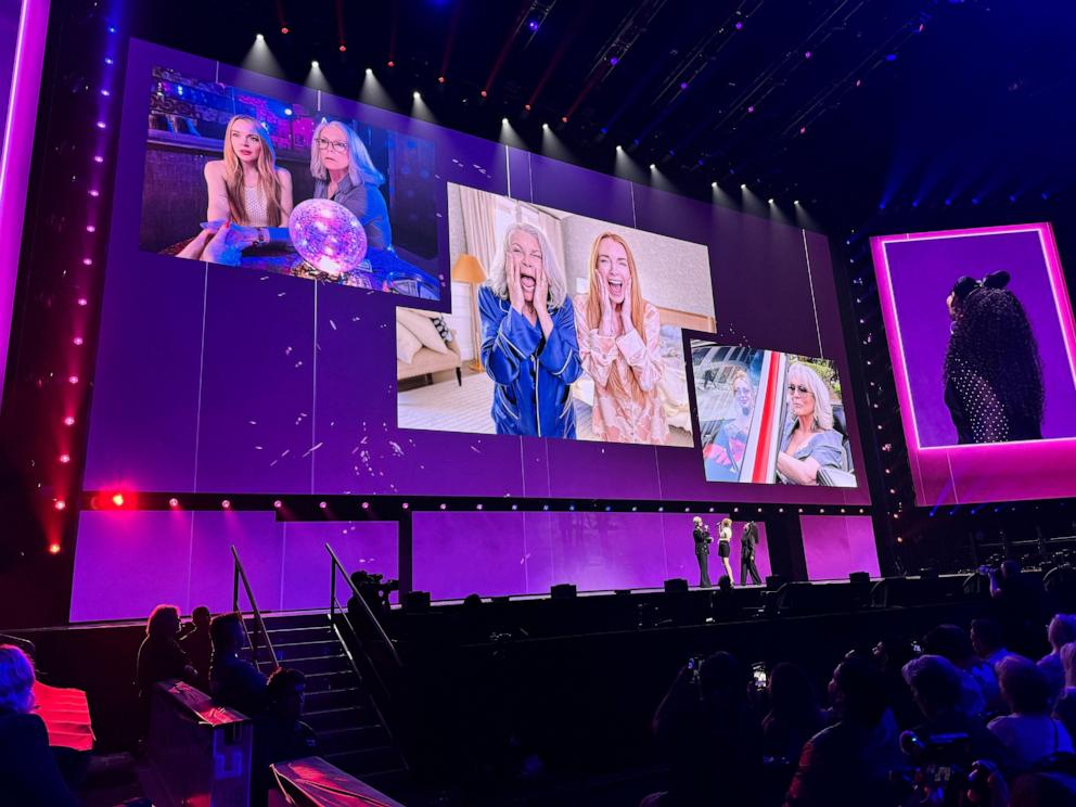 PHOTO: Jamie Lee Curtis and Lindsay Lohan speak onstage about the sequel to "Freaky Friday" at D23, Aug. 9, 2024, in Anaheim, Calif.