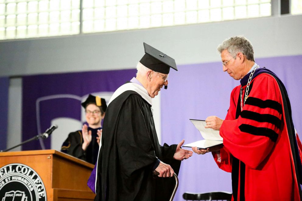 PHOTO: Fred Taylor walks the stage at the Cornell College commencement ceremony on May 14, 2023.