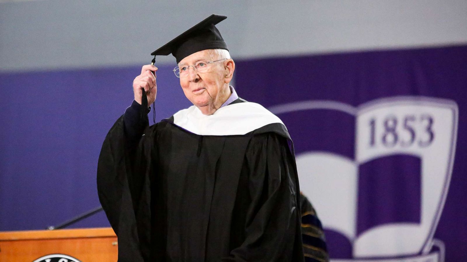 PHOTO: Fred Taylor walks the stage at the Cornell College commencement ceremony on May 14, 2023.